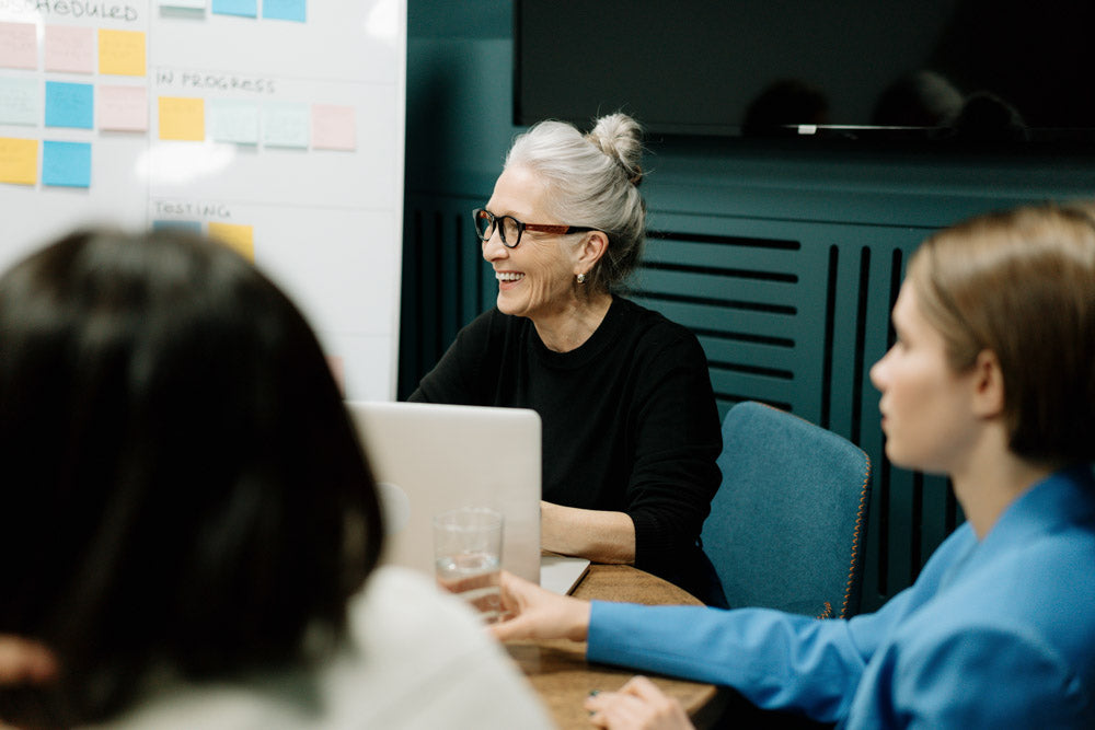 People collaborating at a company meeting 